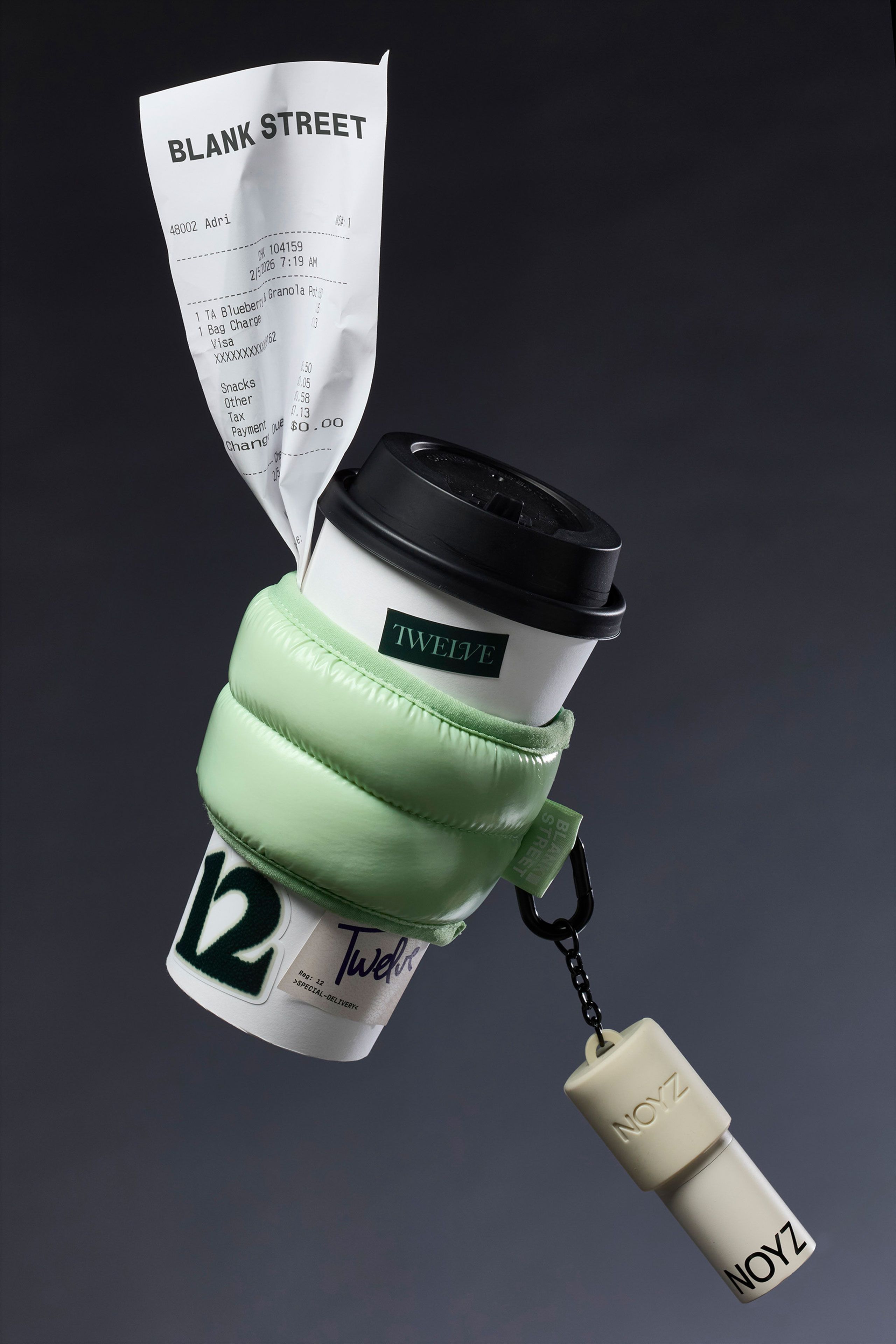 Blank Street puff sleeve beverage accessory with NOYZ branded keychain