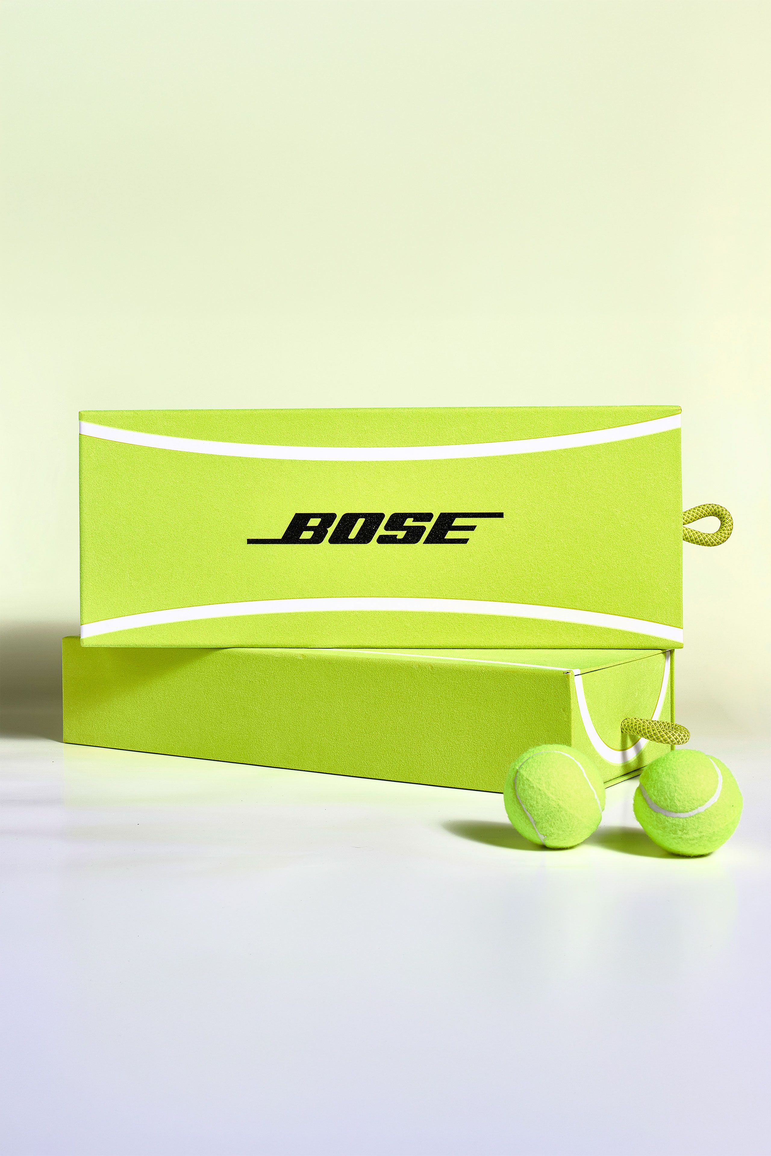 Bose U.S. Open promotional kit featuring custom tennis ball material slider box packaging