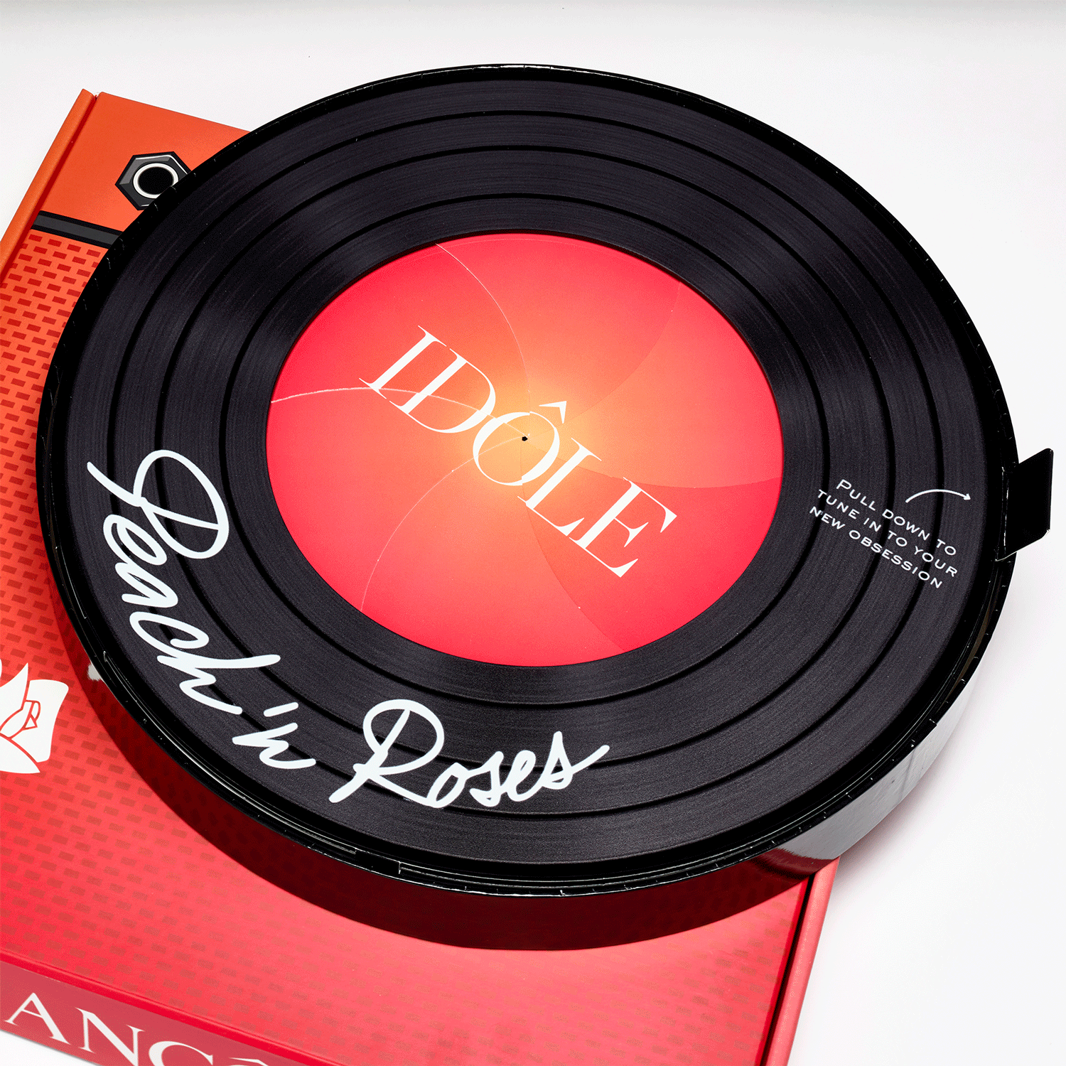 Lancôme fragrance launch mailer with custom vinyl record-inspired packaging