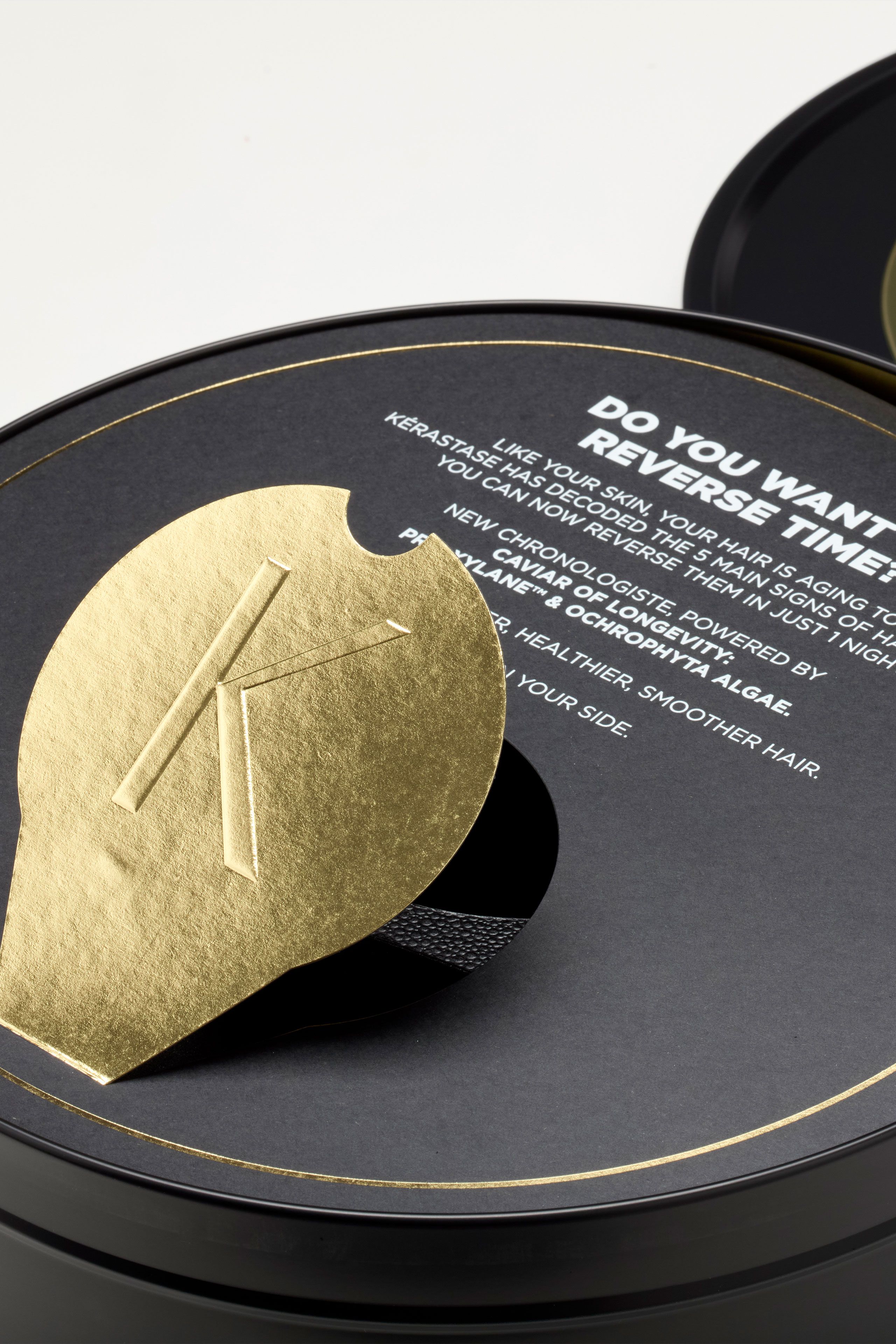 Kerastase Chronologiste PR mailer tin with caviar inspired artwork and opening